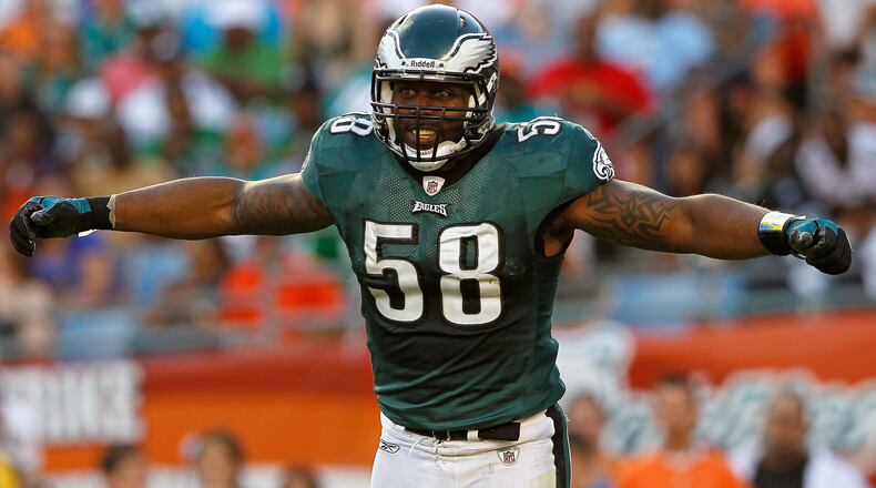 MIAMI GARDENS, FL - DECEMBER 11: Trent Cole #58 of the Philadelphia Eagles celebrates a sack during a game against the Miami Dolphins at Sun Life Stadium on December 11, 2011 in Miami Gardens, Florida. (Photo by Mike Ehrmann/Getty Images)