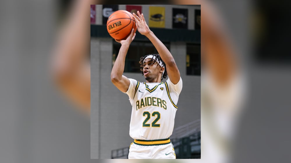 Wright State sophomore guard TJ Burch shoots a 3-pointer during an 86-37 win over Franklin College 86-37 in a season opener on Monday, Nov. 3 at Ervin J. Nutter Center in Fairborn. BRYANT BILLING/STAFF