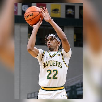 Wright State sophomore guard TJ Burch shoots a 3-pointer during an 86-37 win over Franklin College 86-37 in a season opener on Monday, Nov. 3 at Ervin J. Nutter Center in Fairborn. BRYANT BILLING/STAFF