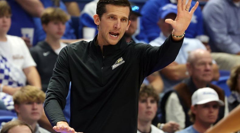 Wright State head coach Clint Sargent directs his team during the first half of an NCAA college basketball game against Kentucky in Lexington, Ky., Monday, Nov. 4, 2024. (AP Photo/James Crisp)