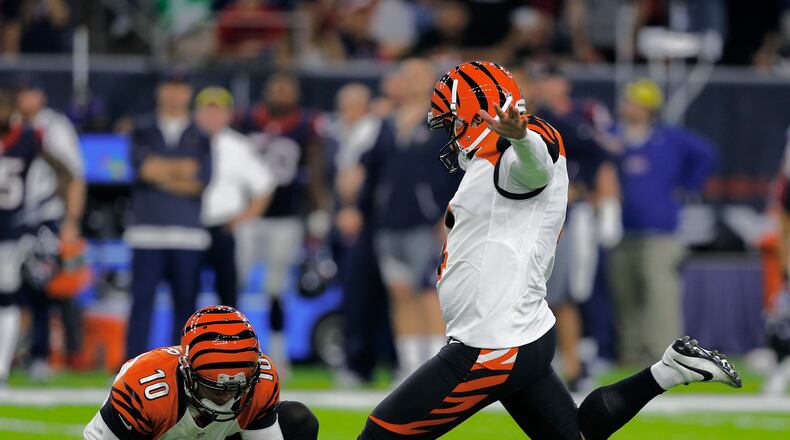 HOUSTON, TX - DECEMBER 24: Randy Bullock #4 of the Cincinnati Bengals watches as he misses a 43 yard field goal in the closing seconds to give the Houston Texans a 12-10 win at NRG Stadium on December 24, 2016 in Houston, Texas. (Photo by Bob Levey/Getty Images)