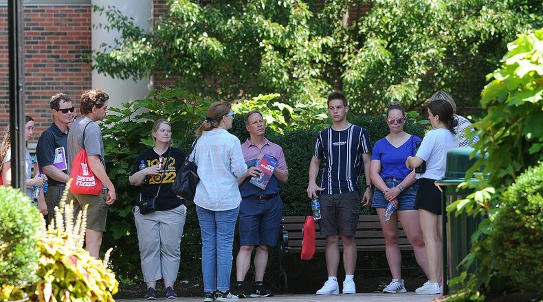 Families of future UD students tour the campus Friday July 22, 2022. The University of Dayton does not require masks, but they do recommend them to be worn indoors, especially as COVID-19 cases climb. MARSHALL GORBY\STAFF