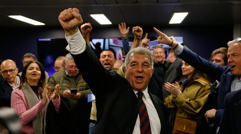 Candidate, Joan Laporta reacts during early voting projections for the election to be president of FC Barcelona soccer club in Barcelona, Spain, Sunday, March 15, 2026. (AP Photo/Joan Monfort)