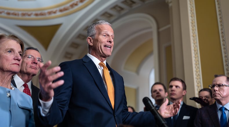 Senate Majority Leader John Thune, R-S.D., joined at left by Sen. Shelly Moore Capito, R-W.Va., and Sen. John Barrasso, R-Wyo., the GOP whip, speaks with reporters following a closed-door meeting with Vice President JD Vance on day 28 of the government shutdown, at the Capitol in Washington, Tuesday, Oct. 28, 2025. (AP Photo/J. Scott Applewhite)