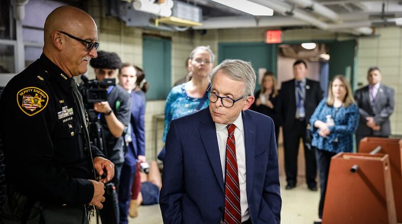 Ohio Gov. Mike DeWine tours the Greene County jail Friday, April 21, 2023. DeWine helped secure a $15 million grant to support construction of a new jail. JIM NOELKER/STAFF