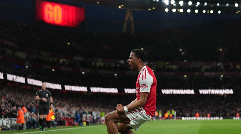 Arsenal's Jurrien Timber celebrates after scoring during the Premier League soccer match between Chelsea Arsenal in London Sunday, March 1, 2026. (AP Photo/Alastair Grant)