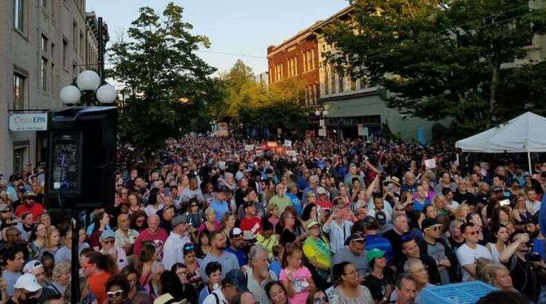 A candlelight vigil was held in Dayton's Oregon District on Aug. 4, 2019. Earlier that morning a gunman killed nine people and caused 17 others to be injured. Dayton police killed the gunman. Governor Mike DeWine was met with shouts of “Do something” from the crowd, amid frustration over another mass shooting.