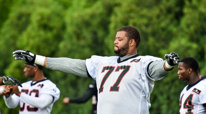 Bengals’ offensive tackle Cordy Glenn stretches during organized team activities Tuesday, May 22, 2018, at the practice facility near Paul Brown Stadium in Cincinnati. NICK GRAHAM/STAFF