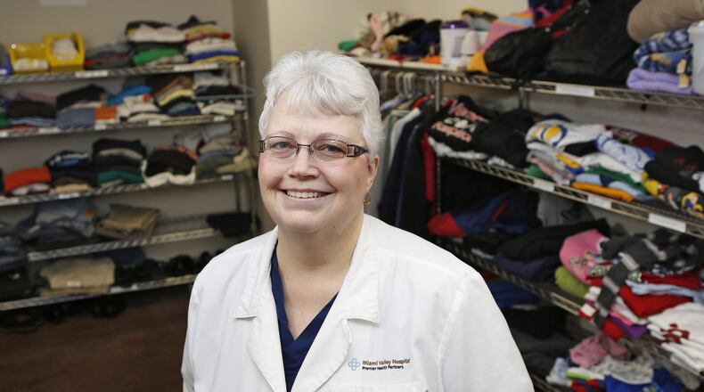 Cindy Feltner, trauma clinic nurse, stands inside Cindy’s Closet at Miami Valley Hospital. CONTRIBUTED
