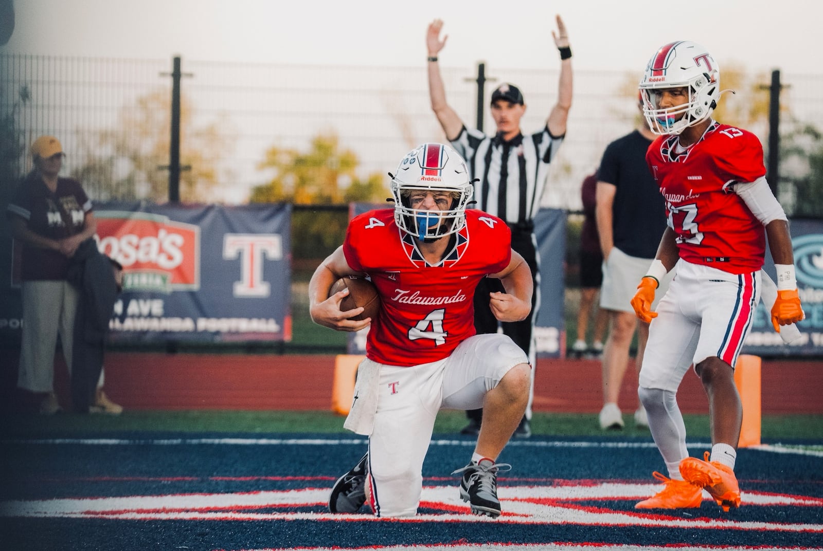 Talawanda quarterback Oliver Bennett celebrates a touchdown against Ross on Friday night. JORDAN PHILLIPS / CONTRIBUTED