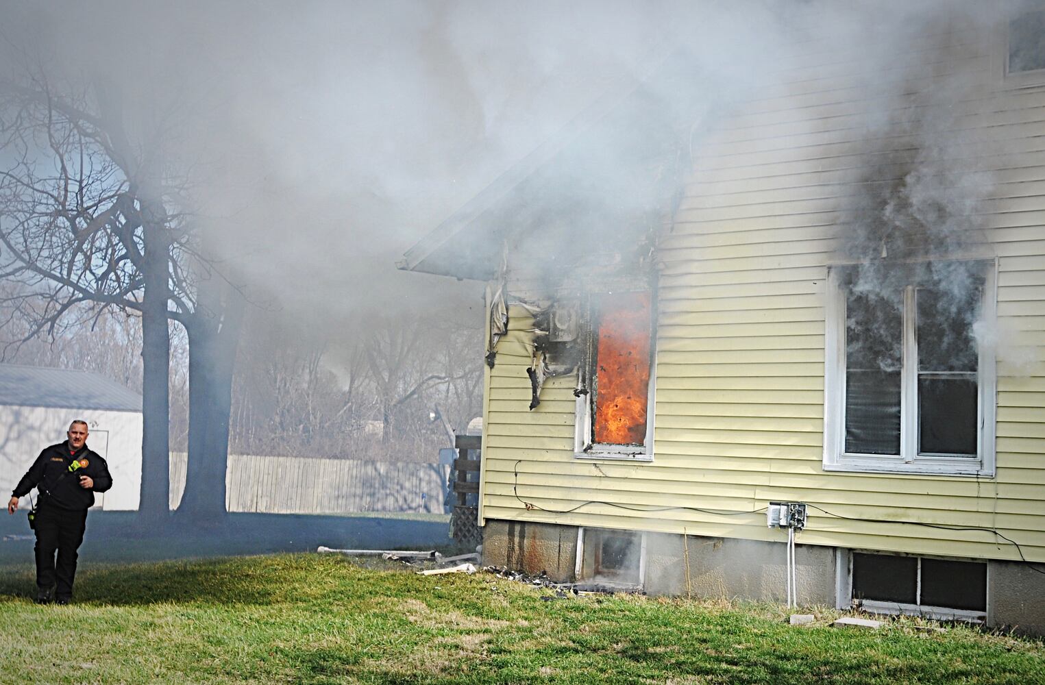 PHOTOS: Crews fight fire in on National Road in New Carlisle