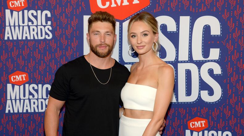 NASHVILLE, TENNESSEE - JUNE 05: Chris Lane and Lauren Bushnell attend the 2019 CMT Music Awards at Bridgestone Arena on June 05, 2019 in Nashville, Tennessee. (Photo by Rick Diamond/Getty Images for CMT)