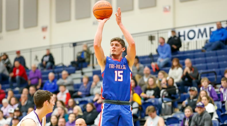 Tri-Village High School senior Layne Sarver shoots the ball during their game against Howard East Knox on Tuesday night at Kettering’s Trent Arena. Sarver scored 32 points as the Patriots won 60-38. CONTRIBUTED PHOTO BY MICHAEL COOPER