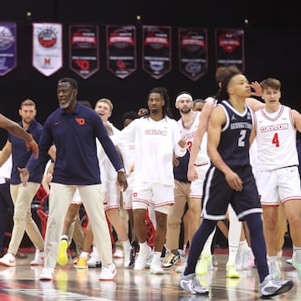 Dayton's Anthony Grant reacts after a play against Georgetown on Thursday, Nov. 27, 2025, at the State Farm Field House in Kissimmee, Fla. David Jablonski/Staff