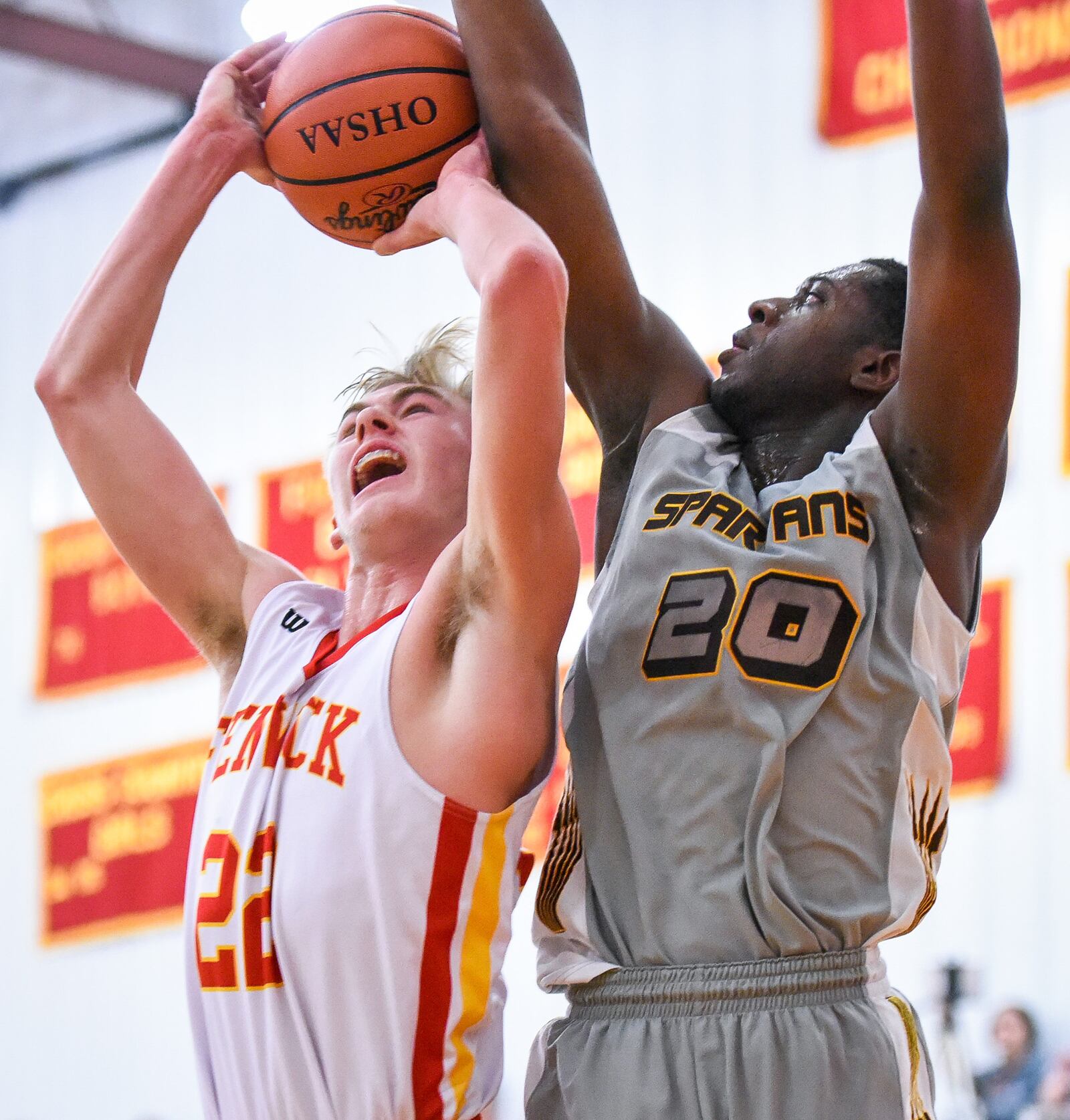 Fenwick's C.J. Napier tries to get a shot off against Roger Bacon's James Johnson during Friday night’s game at Fenwick. NICK GRAHAM/STAFF