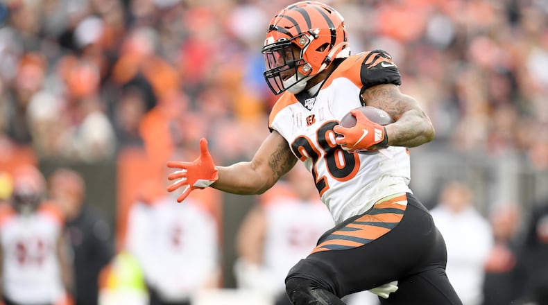 CLEVELAND, OHIO - DECEMBER 08: Running back Joe Mixon #28 of the Cincinnati Bengals runs for a gain during the second half against the Cleveland Browns at FirstEnergy Stadium on December 08, 2019 in Cleveland, Ohio. The Browns defeated the Bengals 27-19. (Photo by Jason Miller/Getty Images)