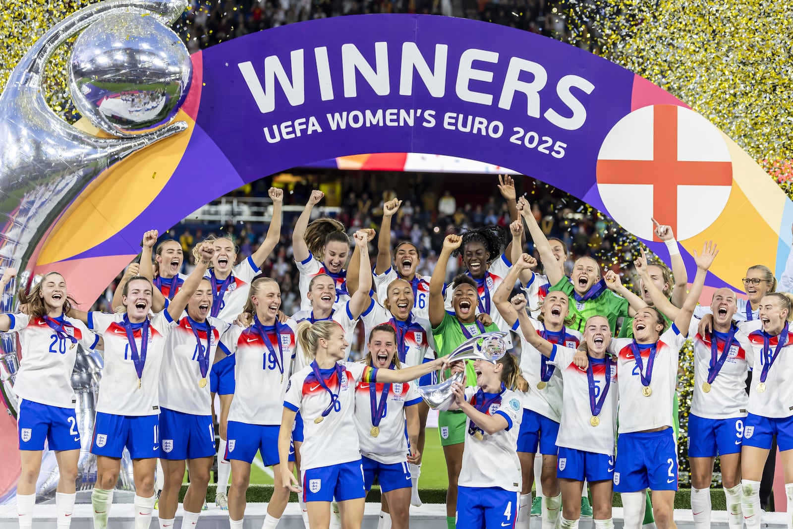 England players lift the trophy after after winning the Women's Euro 2025 final soccer match between England and Spain at St. Jakob-Park in Basel, Switzerland, Sunday, July 27, 2025. (Michael Buholzer/Keystone via AP)