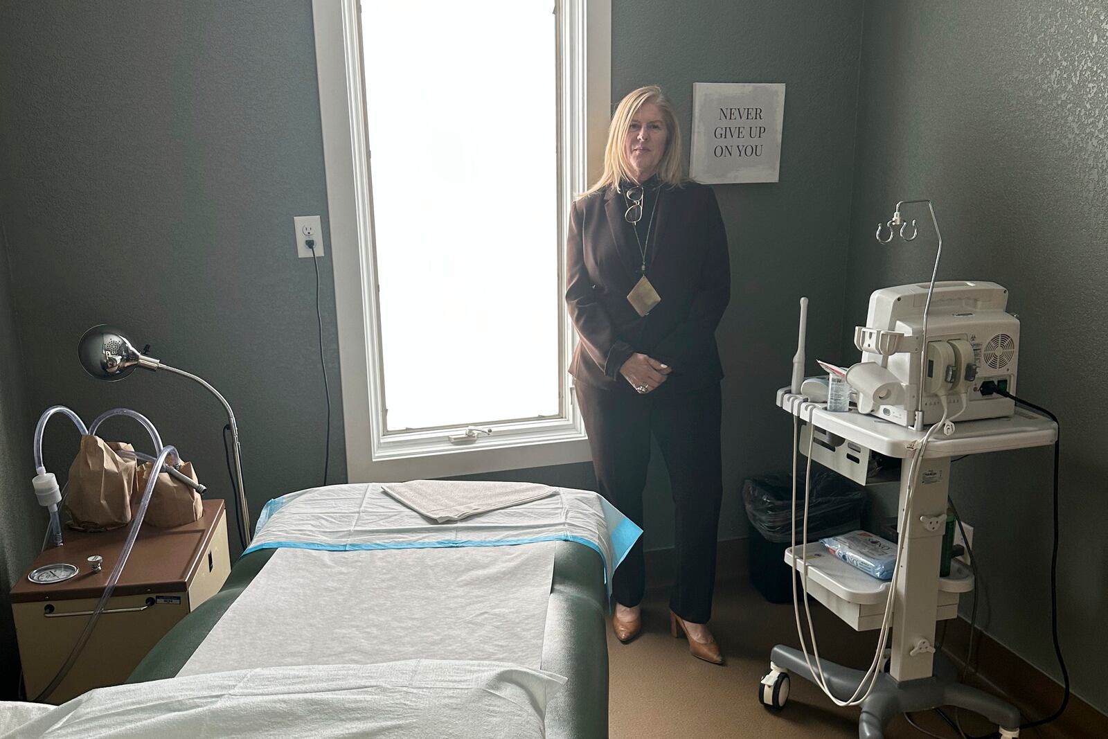 Julie Burkhart, founder and president of Wellspring Health Access, Wyoming's only abortion clinic, is seen in a procedure room in the clinic Tuesday, April 8, 2025, in Casper, Wyo. (AP Photo/Mead Gruver)