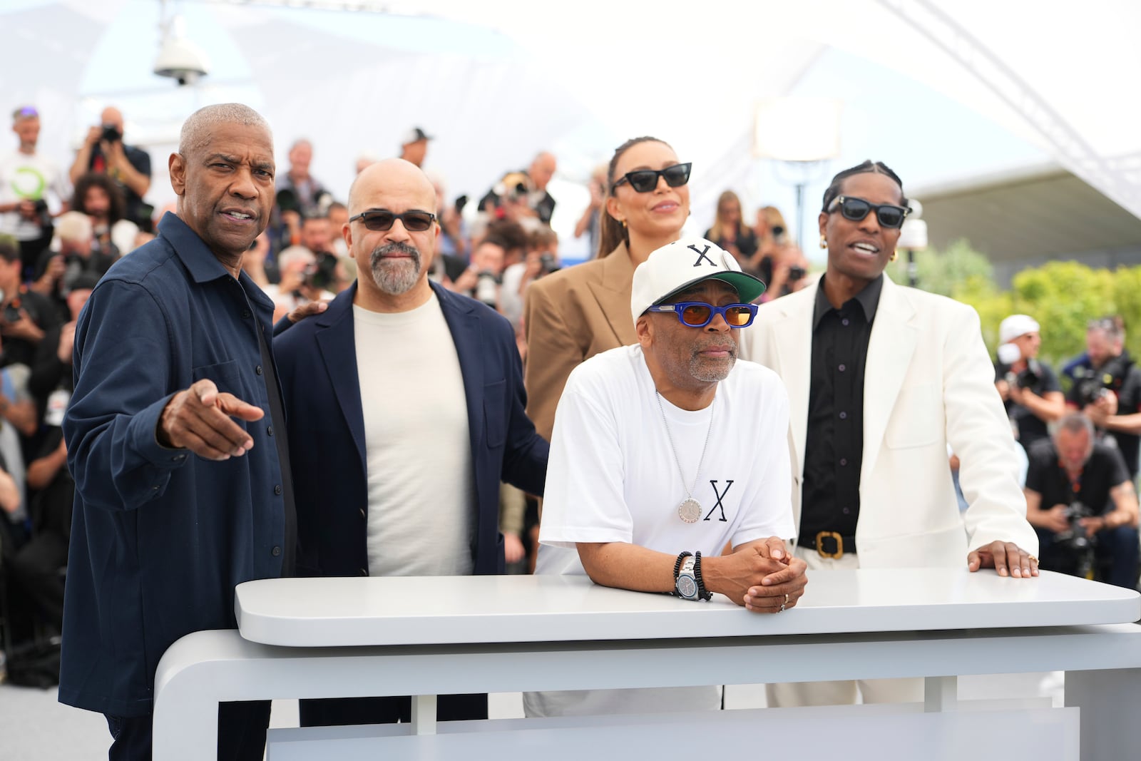 Denzel Washington, from left, Jeffrey Wright, Ilfenesh Hadera, director Spike Lee and A$AP Rocky pose for photographers at the photo call for the film 'Highest 2 Lowest' at the 78th international film festival, Cannes, southern France, Monday, May 19, 2025. (Photo by Lewis Joly/Invision/AP)
