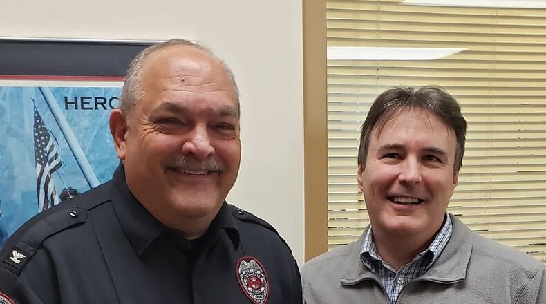 Beavercreek City Manager Pete Landrum awards Chief Evers with the 2019 Employee of the Year award. Evers will officially be recognized on March 11 at the 2020 Annual Beavercreek Chamber of Commerce meeting.