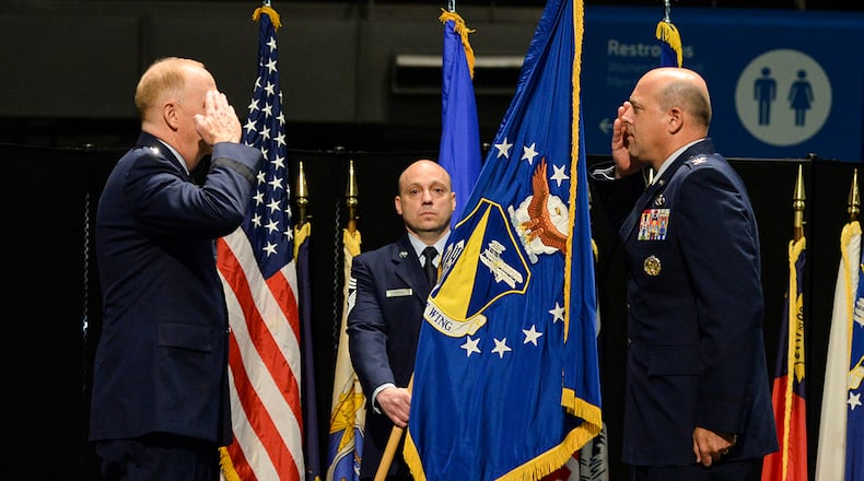 Col. Patrick Miller assumes command of the 88th Air Base Wing from Lt. Gen. Robert McMurry, Air Force Life Cycle Management Center commander, during a change of command ceremony inside the National Museum of the United States Air Force at Wright-Patterson Air Force Base June 12. U.S. AIR FORCE PHOTO/WESLEY FARNSWORTH