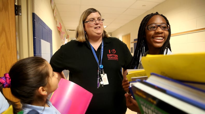Some teachers like Melodie Larsen make Dayton Public Schools a career because, as she says, “this is where I’m needed.” But many others leave for suburban school districts after working in DPS for a few years. LISA POWELL /STAFF