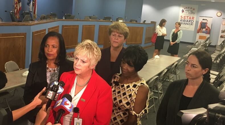 Dayton Public Schools administrators address media questions about their contract dispute with teachers. From left are Treasurer Hiwot Abraha, Superintendent Rhonda Corr, Associate Superintendent Elizabeth Lolli, Associate Superintendent Shelia Burton and legal counsel Jyllian Bradshaw. JEREMY P. KELLEY / STAFF