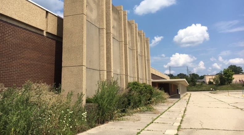 The Trotwood Sears building at the former Salem Mall is expected to be purchased by the Trotwood Community Improvement Corporation early next month. THOMAS GNAU/STAFF