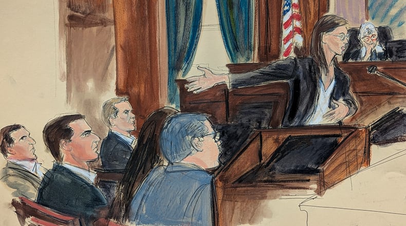FILE - In this courtroom sketch, assistant U.S. Attorney Madison Smyser gestures to Alon Alexander, Oren Alexander and Tal Alexander as she presents her opening statement with Judge Valerie Caproni presiding on the bench in Manhattan federal court in New York, on Jan. 27, 2026. (Elizabeth Williams via AP, File)