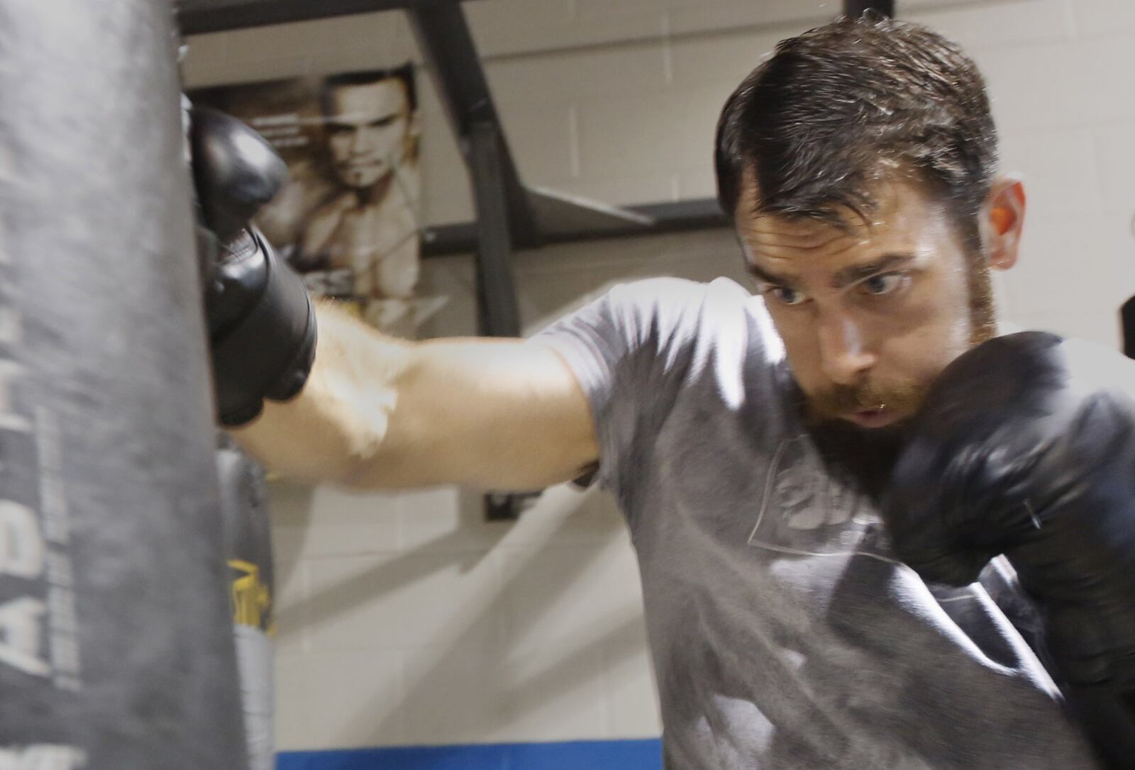 Warren Roberds, 29, headlines an MMA card in Akron on July 29. Roberds, who launched his professional career in Las Vegas, now trains in downtown Dayton at Drake’s Gym. TY GREENLEES / STAFF