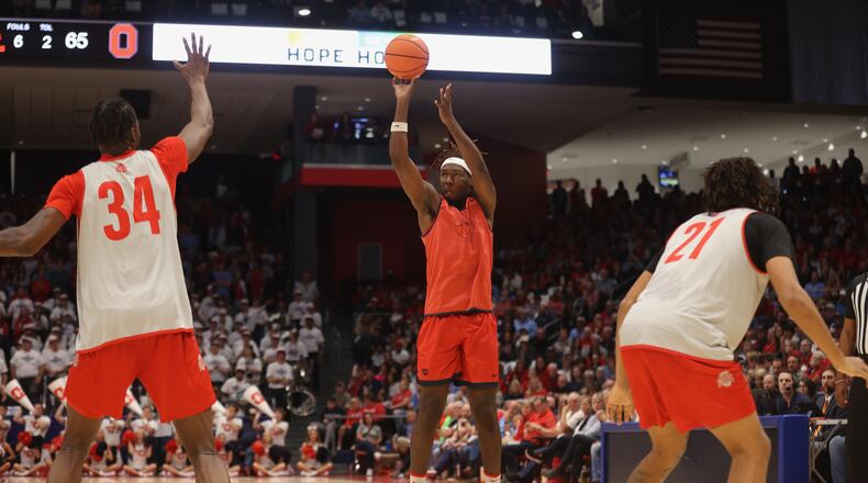 Dayton's Jaiun Simon shoots against Ohio State in an exhibition game on Sunday, Oct. 22, 2023, at UD Arena. David Jablonski/Staff