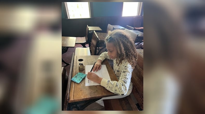 Pamela’s daughter, Jasmine, practices her penmanship at Carillon Historical Park during Homeschool Day. Many local venues offer special homeschool events throughout the year. CONTRIBUTED