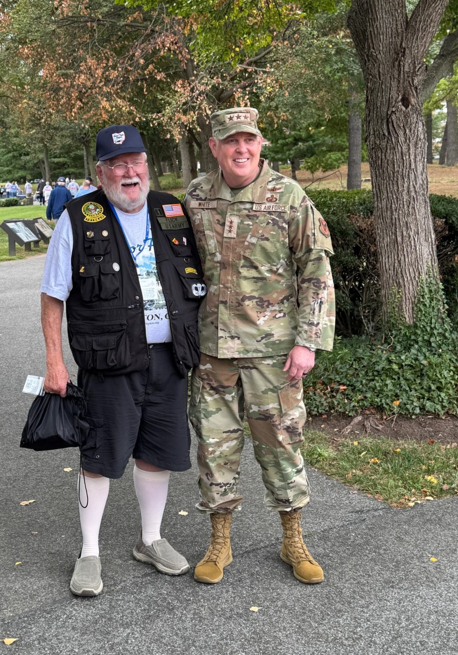 Air Force Lt. Gen. Dale White takes a photo with a Vietnam veteran who was part of Honor Flight Dayton in Washington, D.C., Sept. 21, 2025. Air Force photo by Lt. Col. Casey Staheli