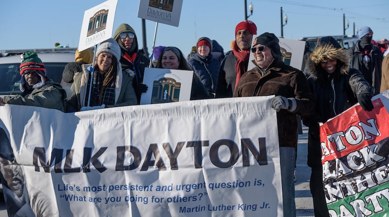 Daytonians gathered to honor Rev. Dr. Martin Luther King Jr. at the annual MLK Day Memorial March on Monday, Jan. 20, 2025, amid sub-zero wind chills. TOM GILLIAM / CONTRIBUTING PHOTOGRAPHER