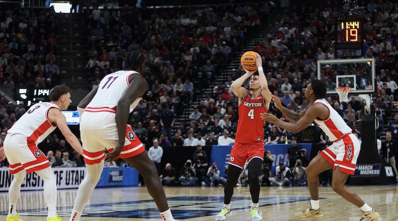 Dayton's Koby Brea makes a 3-pointer against Arizona in the second round of the NCAA tournament on Saturday, March 23, 2024, at the Delta Center in Salt Lake City, Utah. David Jablonski/Staff