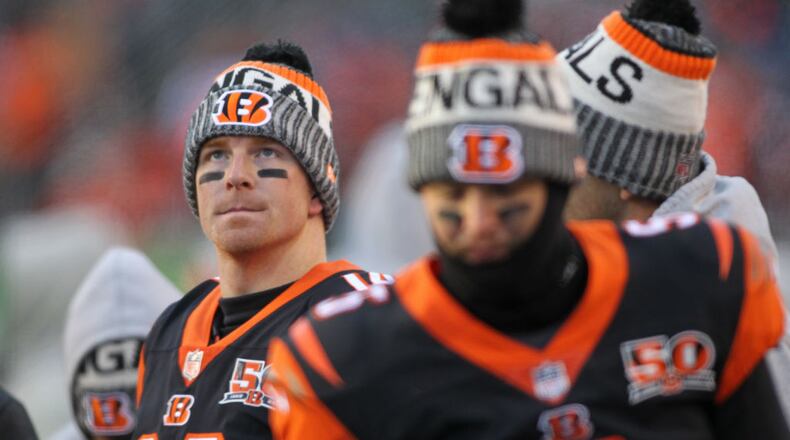 CINCINNATI, OH - DECEMBER 10: Andy Dalton #14 of the Cincinnati Bengals looks on as he is replaced by AJ McCarron #5 against the Chicago Bears during the second half at Paul Brown Stadium on December 10, 2017 in Cincinnati, Ohio. (Photo by John Grieshop/Getty Images)
