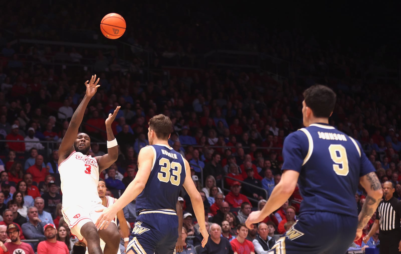 Dayton's Jaiun Simon shoots against George Washington on Tuesday, Jan. 6, 2026, at UD Arena. David Jablonski/Staff