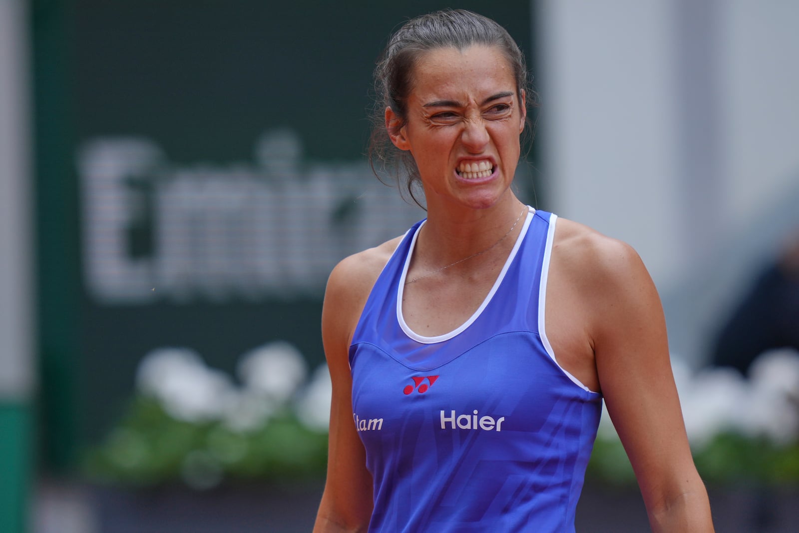 France's Caroline Garcia reacts as she plays United States' Bernarda Pera during their first round match of the French Tennis Open, at the Roland-Garros stadium, in Paris, Monday, May 26, 2025. (AP Photo/Thibault Camus)
