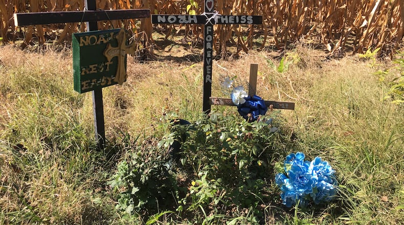 A memorial in Warren County is dedicated to Noah Theiss, 17, who died in a crash in May on Springboro Road. STAFF