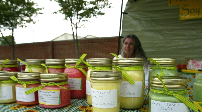 Handmade 100% soy candles are sold by Kathy Zimmer from Free Spirit Farm at the Lebanon Farmer’s Market. STAFF PHOTO