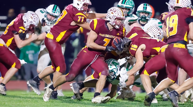 Northeastern High School senior Jackson Jones carries the ball during their game against Anna on Friday, Nov. 14 at Conover Stadium. The Rockets won 28-8. MICHAEL COOPER / STAFF
