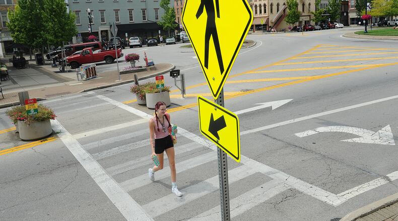 Troy officials are reexamining the crosswalks on the Public Square downtown to see if changes are warranted following complaints from residents concerned about safety. MARSHALL GORBY\STAFF