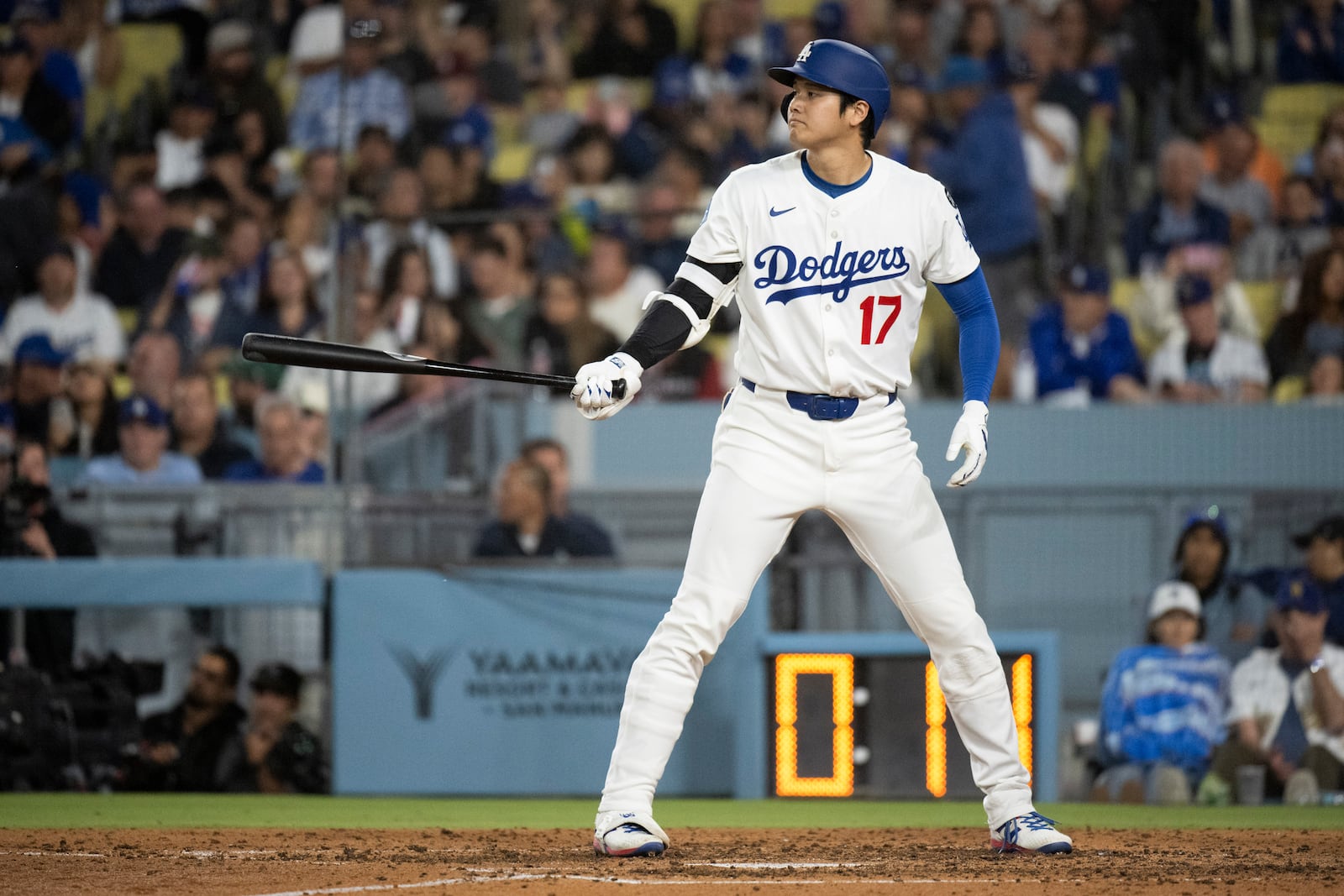 Los Angeles Dodgers' Shohei Ohtani bats during the sixth inning of a baseball game against the Arizona Diamondbacks in Los Angeles, Monday, May 19, 2025. (AP Photo/Kyusung Gong)