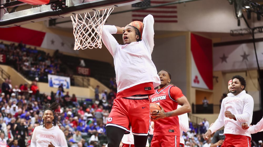 Dayton's Malcolm Thomas dunks before a game against Brigham Young on Friday, Nov. 28, 2025, at the State Farm Field House in Kissimmee, Fla. David Jablonski/Staff