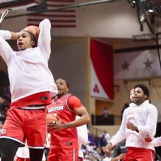 Dayton's Malcolm Thomas dunks before a game against Brigham Young on Friday, Nov. 28, 2025, at the State Farm Field House in Kissimmee, Fla. David Jablonski/Staff