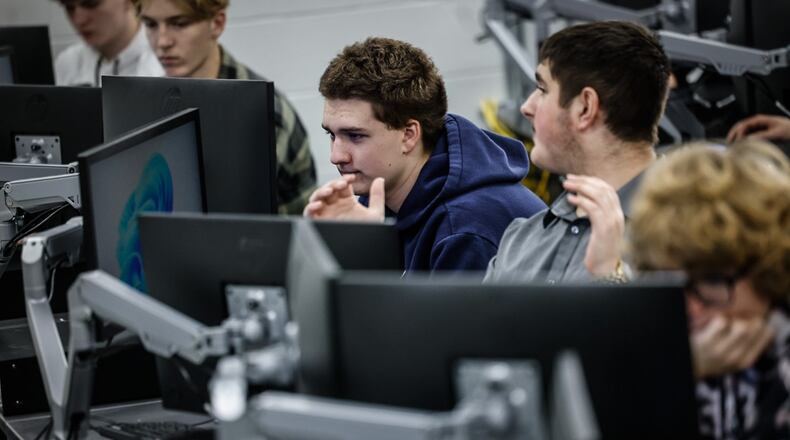 Beavercreek High School students study in the district's new computer science career tech class Thursday November 21, 2024. JIM NOELKER/STAFF