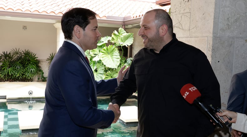 FILE - Secretary of State Marco Rubio, left, and Secretary of the National Security of Ukraine Rustem Umerov shake hands, Nov. 30, 2025, in Hallandale Beach, Fla. (AP Photo/Terry Renna, File)
