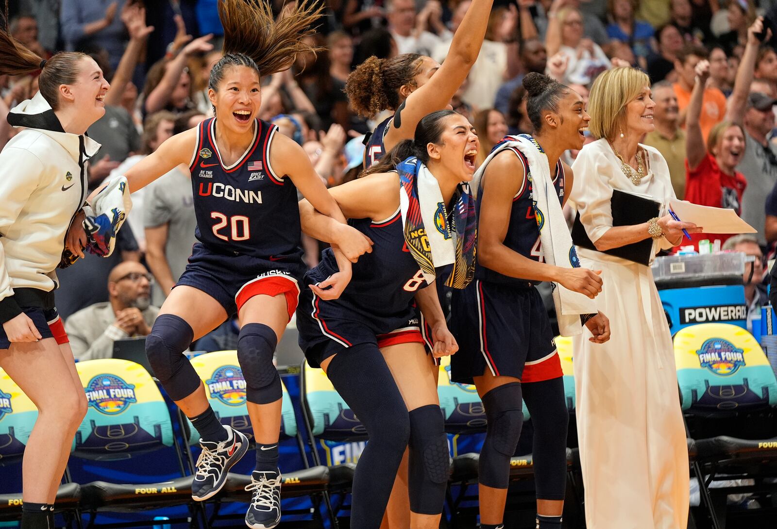UConn players celebrate during the second half of the national championship game against South Carolina at the Final Four of the women's NCAA college basketball tournament, Sunday, April 6, 2025, in Tampa, Fla. (AP Photo/John Raoux)