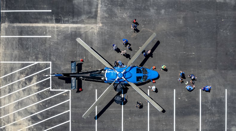 People tour CareFlight during a community open house on Sunday for the new Beavercreek Emergency Center.