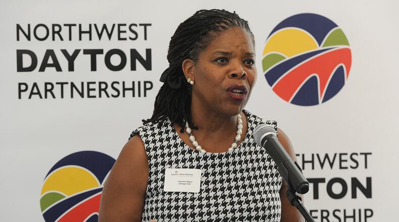 Omega CDC President Vanessa Ward talked to city leaders and community members about the launch of the Northwest Dayton Partnership on Thursday, Aug. 12, 2012. The event was held at the Dayton Metro Library-Northwest Branch. MARSHALL GORBY\STAFF